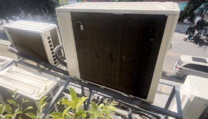 广东一女子家里太热，发现阳台外被挂了12台空调外机